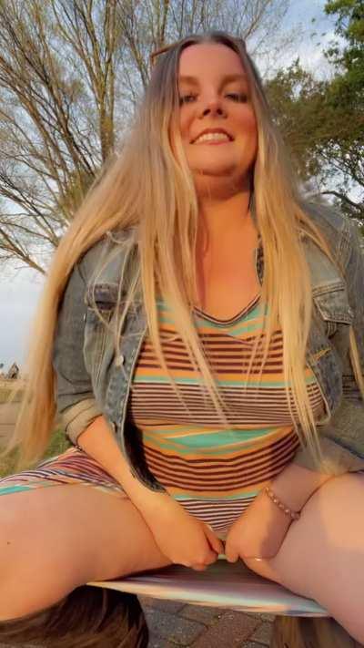 hold it in the park (people in back) [GiF]