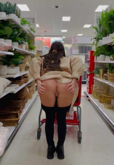 Hotwife spreading cheeks in public