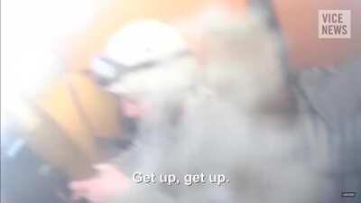 ISIS fighters send off a suicide bomber then go into battle where their armoured vehicle is struck by a rocket