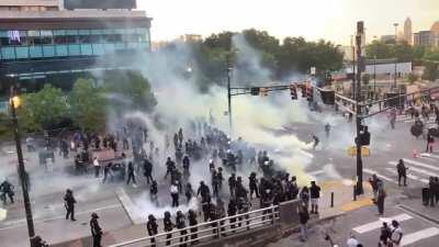 Atlanta police fire tear gas at protesters, wind blows it back in their direction