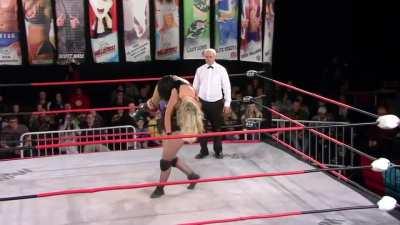 Toni Storm fireman carried by Sammi Baynz