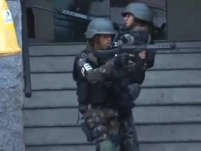 Brazilian forces aginst narco insurgents in Rio de Janeiro. Credits to Marc.Editss_