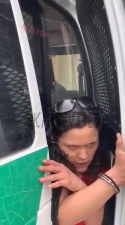 Witch-like creature attacking police officers