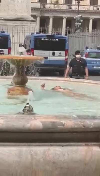 A public fountain is not your personal swimming pool, u know?