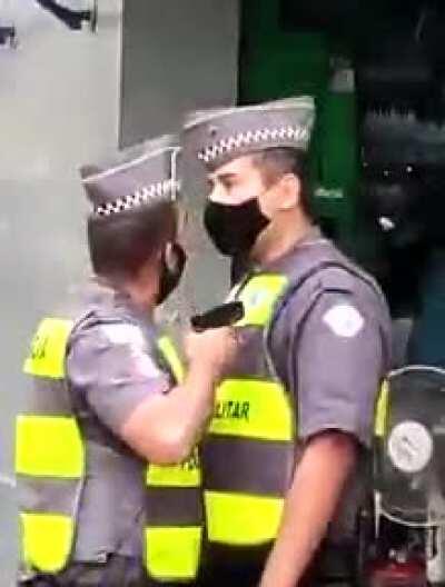 Idiot policeman with gun