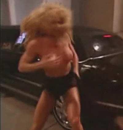 Stephanie stripping Sable’s top clean off