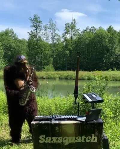 Dude playing sax in a Sasquatch costume