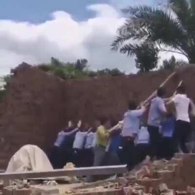 Amateurs demolish a wall, wall retaliates.