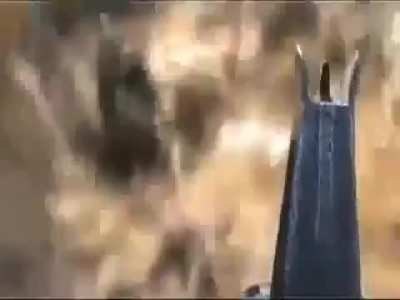 A Syrian Rebel Fighter attaches some sort of camera to an M16A1 and engages a few Assadist Soldiers. It is currently unknown whether the soldiers survived or bled to death. (2013)