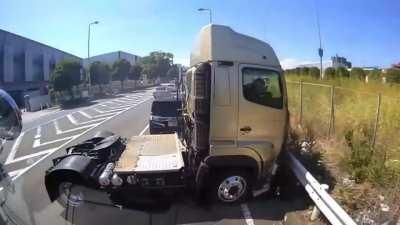 Japanese Biker possibly dies getting sandwiched by Semi and guardrail