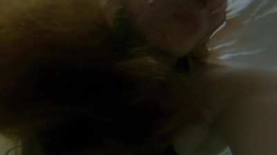 Kseniya talking in a bathtub