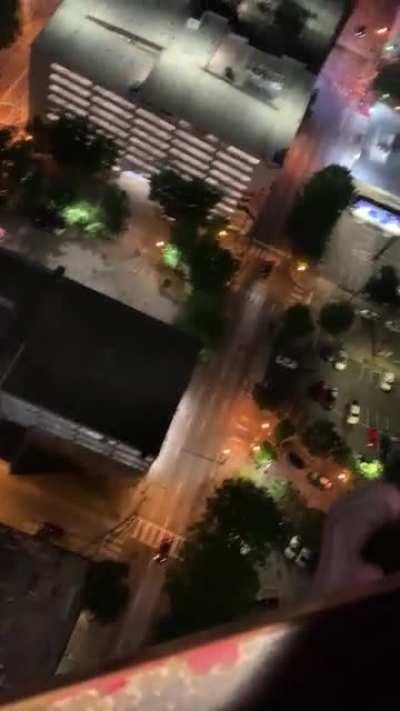 Guy is on a crane with no safety..