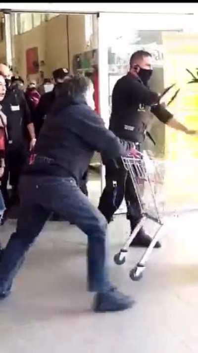 Crazy Chilean Karen kicks shopping cart, gets hit back