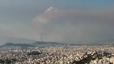 Fire burning outside Athens, GR (For reference, the Acropolis is the leftmost hill)