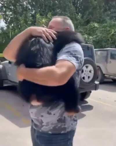 This chimp was born with broken ribs, had pneumonia and was abandoned by his own mother. This couple raised him and showed him love. This is how he reacts whenever he sees them now!