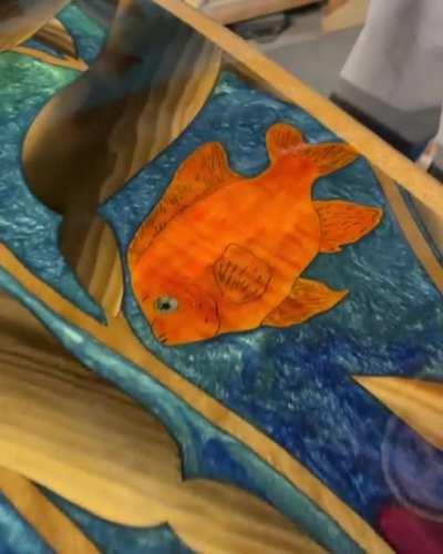 Wait for the flip! Salvaged wood, hollow-frame 7’2”surfboard