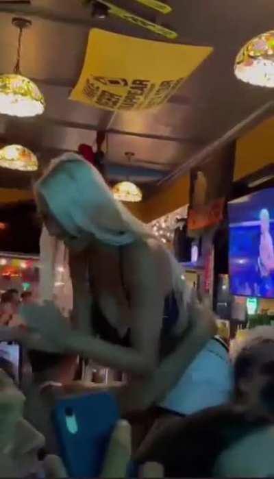 Argentina Woman Flashes Her Breasts in Bar During World Cup Finals
