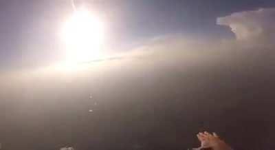 Guy saves skydiver who gets accidentally knocked out