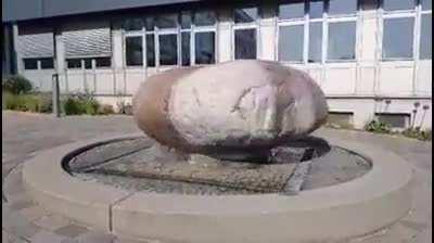 Giant Boulder Moved by Fountain