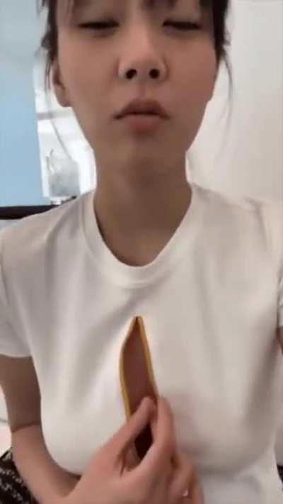 Bibi teasing her cleavage 