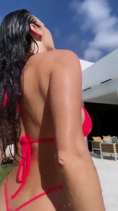 Enjoying a cold shower in a hot summer