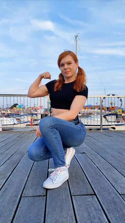 Muscles and pigtails.