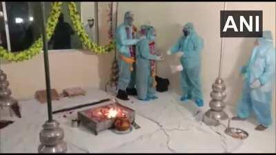A couple in madhya pradesh married wearing ppe because the groom is covid positive.
