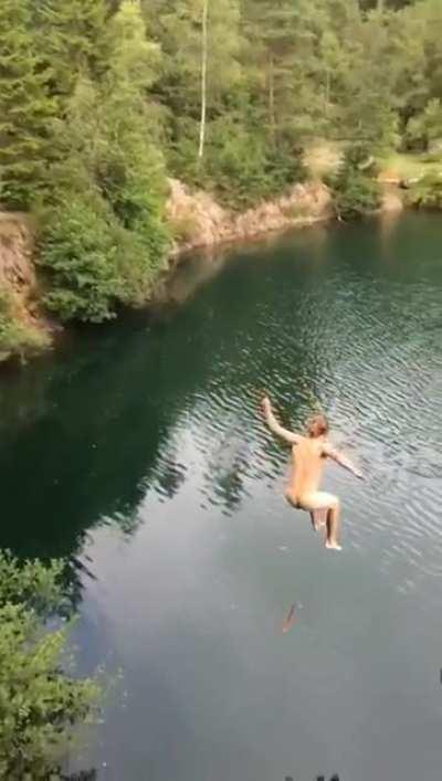 Guy fires a fat dump into a lake