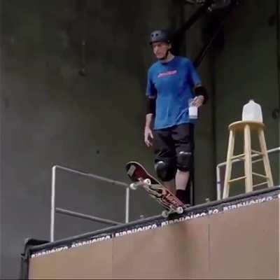 52 year-old Tony Hawk doing a McTwist without spilling a glass of milk
