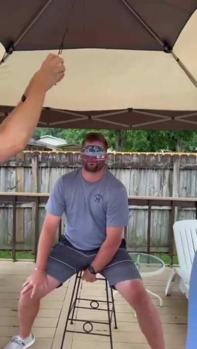 Guy thinks he's dodging a water balloon, ends up embarrassed.