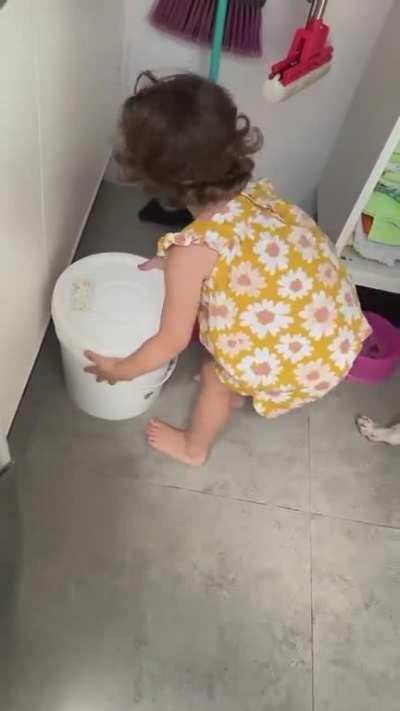 Teaching the child to feed the dog