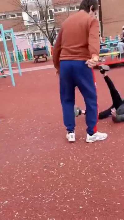 Crazed father throws a boy who was bullying his son to the ground.