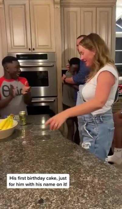 Boy adopted from Sierra Leone experiences his first birthday celebration with his new family