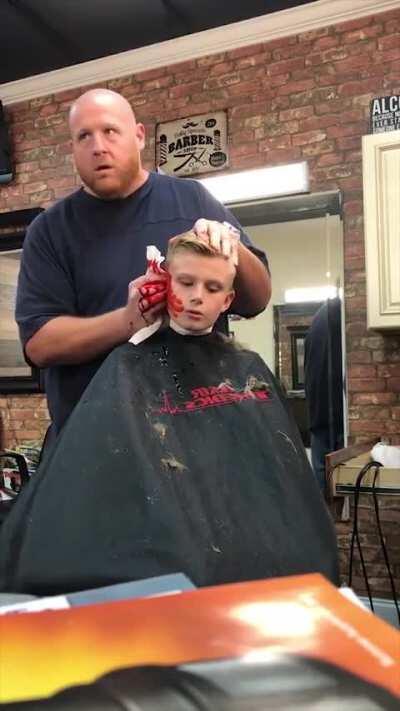 This kid is never getting a haircut again