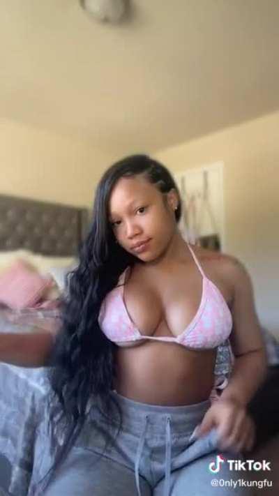 TRYNA UNLOAD ON HER TITS