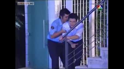 Aum Patcharapa Chaichua Knees a Man Three Times in the Balls, Then She and Duangdao Jarujinda Check Up on Him As He Sits on the Couch in Pain in Kularb Neua Mek/Temptation of Roses 1x14