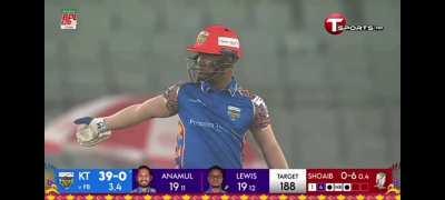 In the over Shoaib Malik bowled 3 no balls, Lewis seems to be signalling the no ball signal to someone