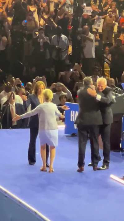 Kamala and Tim meeting their spouses after the rally 