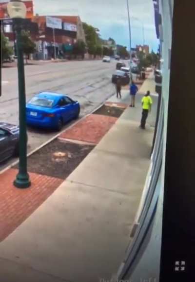 Man in blue shirt shoots somebody over an argument