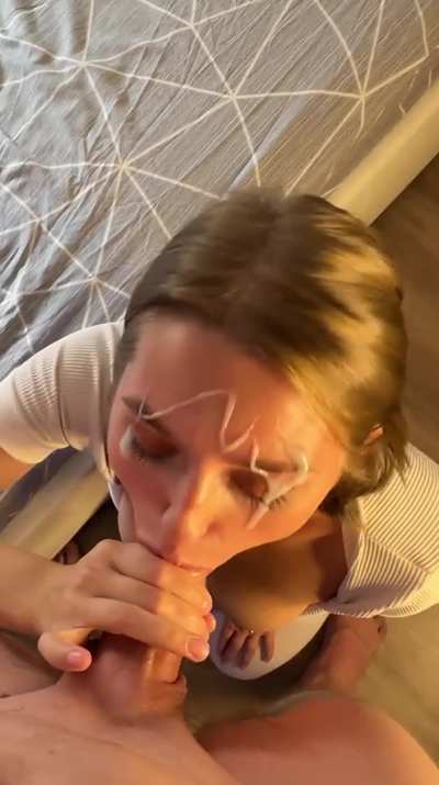 She looks so cute with cum on her pretty face