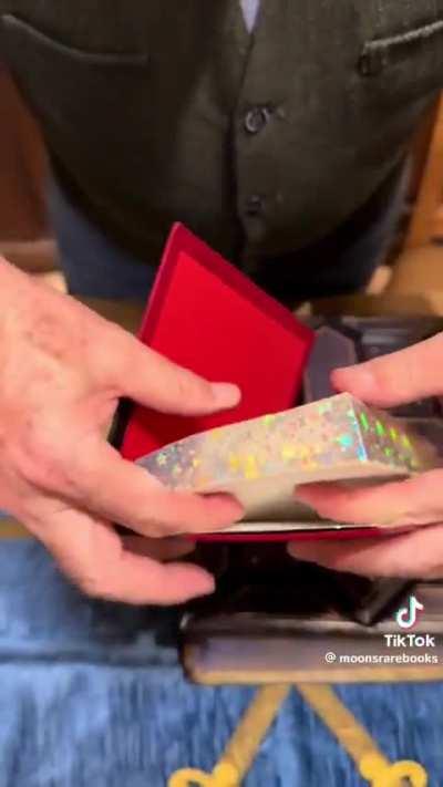 Hidden artwork on the edge of a book pages.