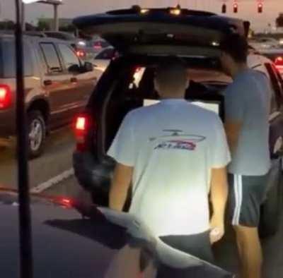 These guys playing Wii at a red light in Florida
