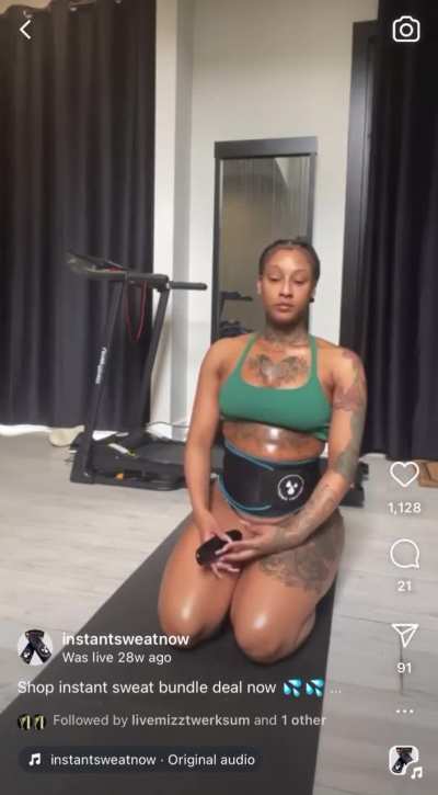 Mizztwerksum working out in a G string on IG Live!