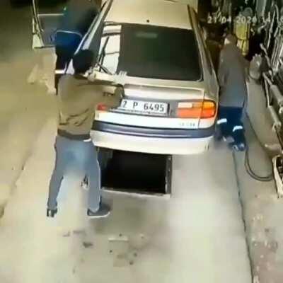 Watch your step while you push the car! xpost r/DontBeStupid