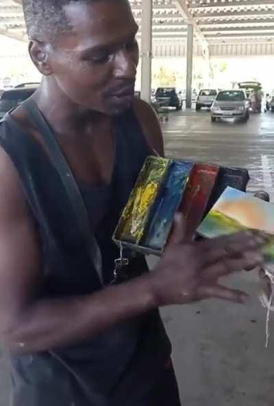 Skilled Man Creates A Painting With Just His Hand