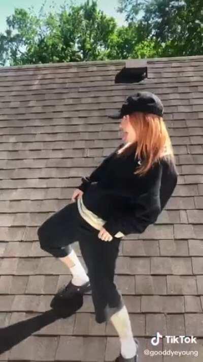 Hayley twerking in Crocks on someone's roof.