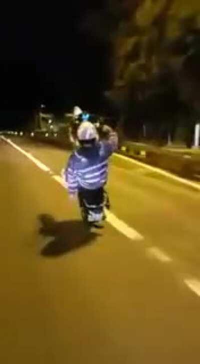 A motorcycle being run over