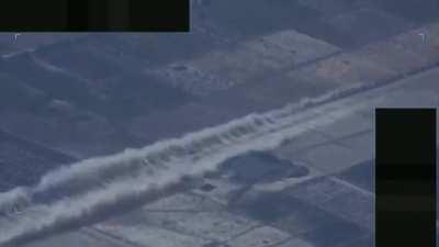 An F-16 fighter jet doing a high-speed low pass over a car as a 