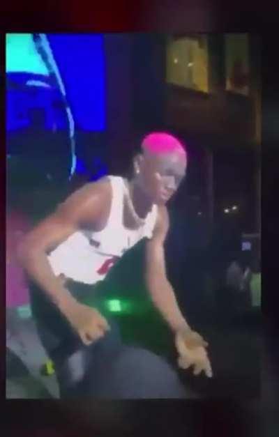 Girl grabs performer by the crotch