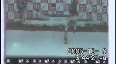 A fan records Räikkönen's bottle drop from the big screen.